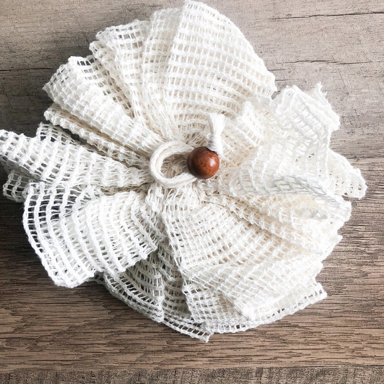 Biodegradable bath/shower pouf made from Ramie fibers.

Softly lathering the skin for a comfortable bathing. Great quality product that will hold up and last long. Amazingly woven material to keep you happy. Great for all ages. This luxury bath sponge will leave your skin glowing and feeling refreshing. Naturally keeping your skin cleansed. Includes loop for hanging and easy drying. It's 100% all natural fiber made from the nettle plant, used for decades in the bath and shower scene--but also in the kitchen too, yes, pots and pans!