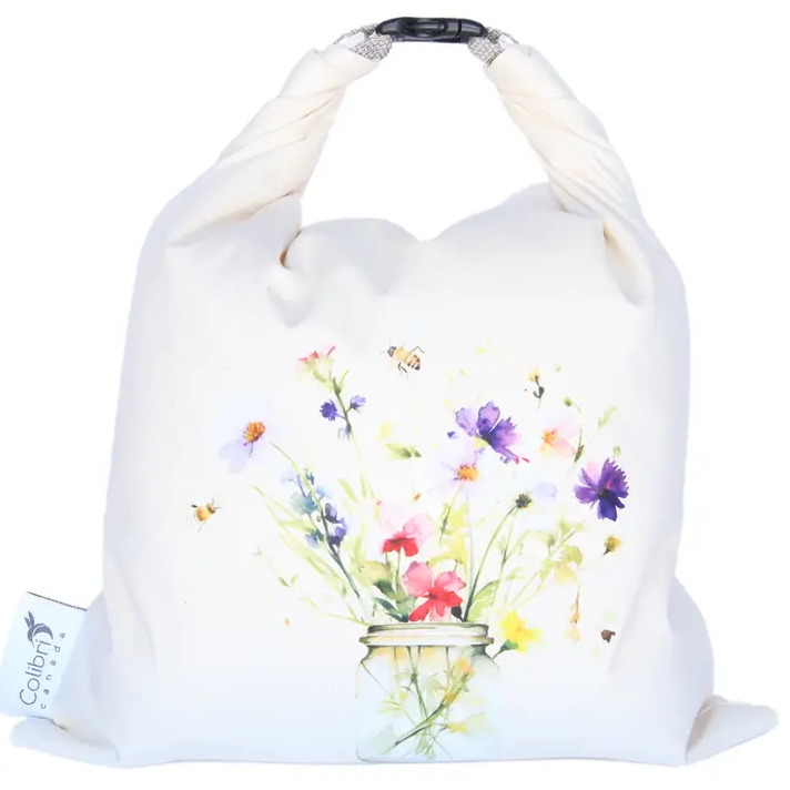 Introducing our premium Reusable Bread Bags, crafted in St. Adolphe Manitoba, these bags are sure to keep your bread fresh while reducing single-use plastics. Colibri's eco-friendly bags feature a 100% cotton outer layer and a food-safe PUL liner, ensuring durability and freshness.